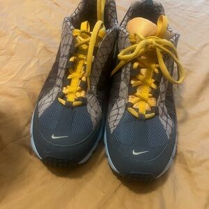Nike Gray and Yellow Sneakers with Bold Accents
